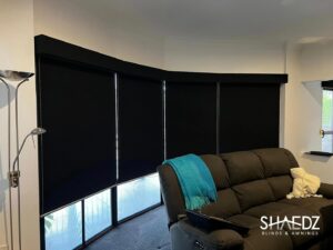 Black Roller Blinds In A Room