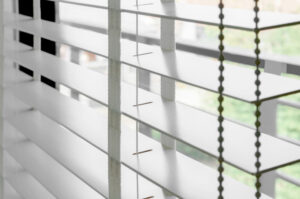 Installed White Roller Blinds on Window